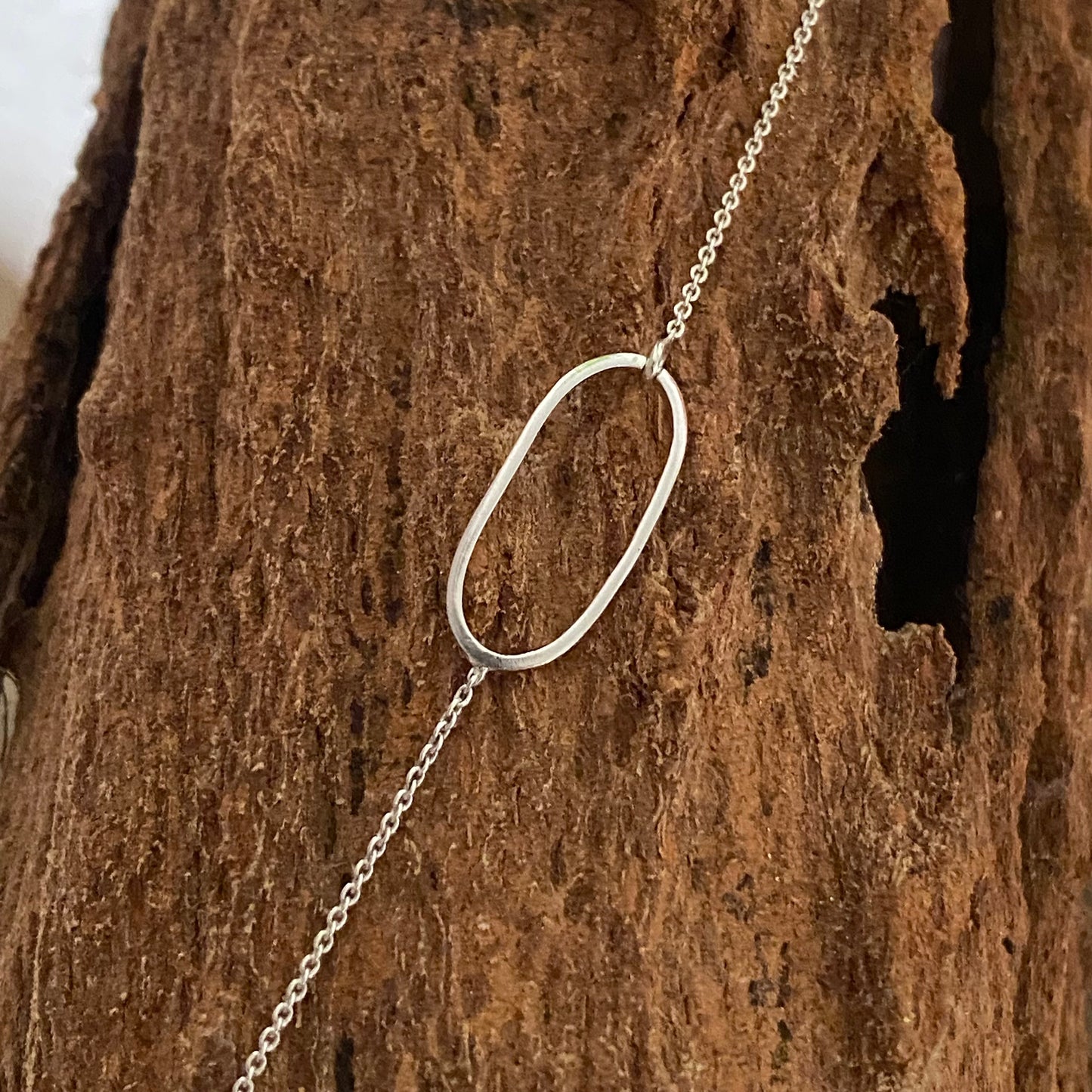 Oval Minimalist Wristlet